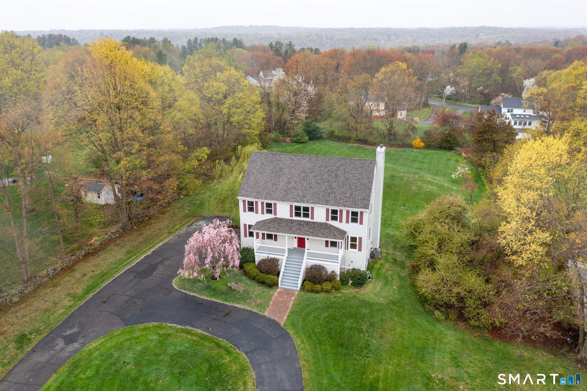 1057 Daniels Farm Road Trumbull, CT 06611 - Photo 2 of 40 an aerial view of a house with a yard