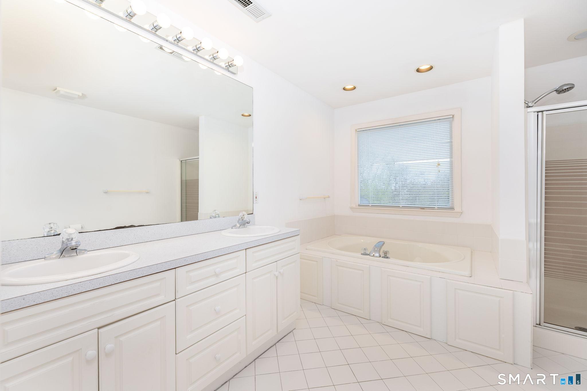 1057 Daniels Farm Road Trumbull, CT 06611 - Photo 30 of 40 a bathroom with a sink a toilet and shower