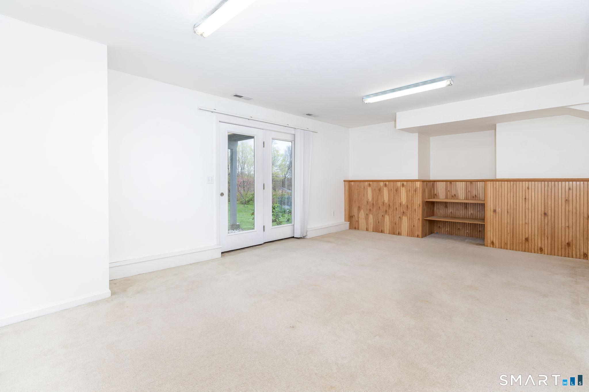 1057 Daniels Farm Road Trumbull, CT 06611 - Photo 34 of 40 a view of an empty room with a window