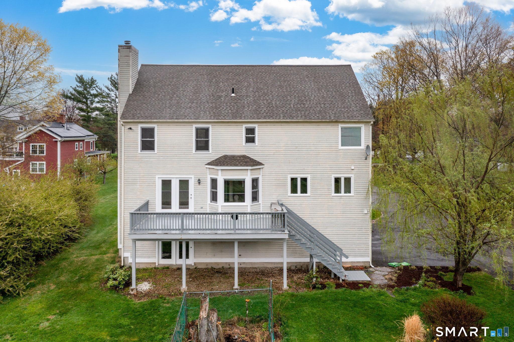 1057 Daniels Farm Road Trumbull, CT 06611 - Photo 37 of 40 a aerial view of a house next to a yard