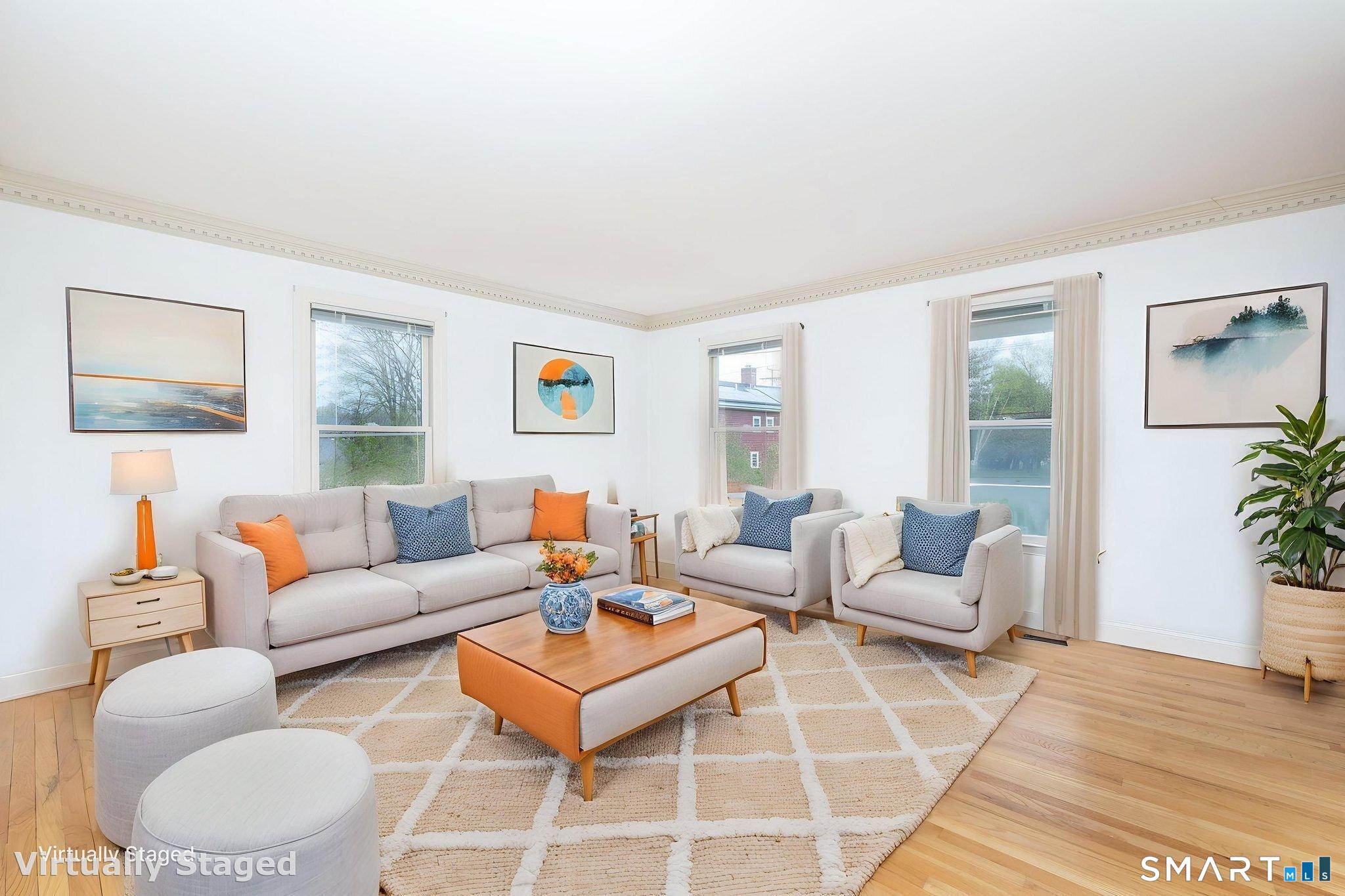 1057 Daniels Farm Road Trumbull, CT 06611 - Photo 8 of 40 a living room with furniture and a potted plant