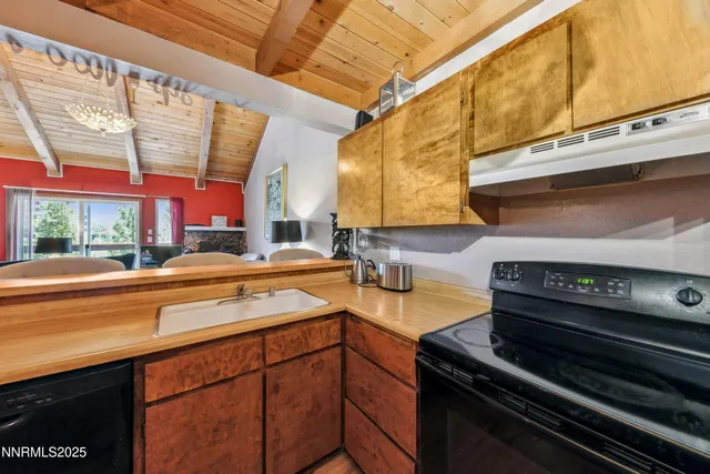 a kitchen with a stove and a microwave