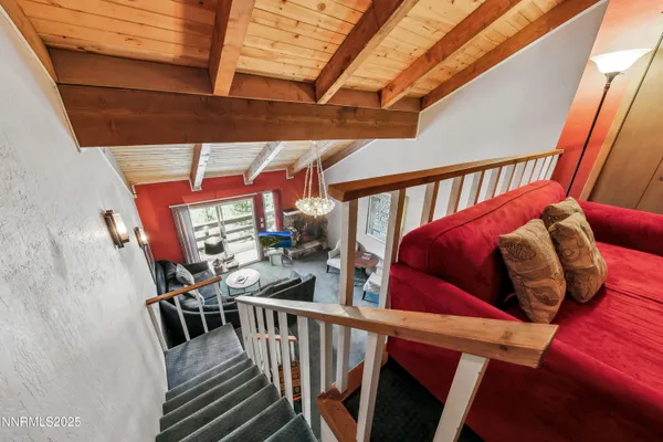 a view of balcony with furniture