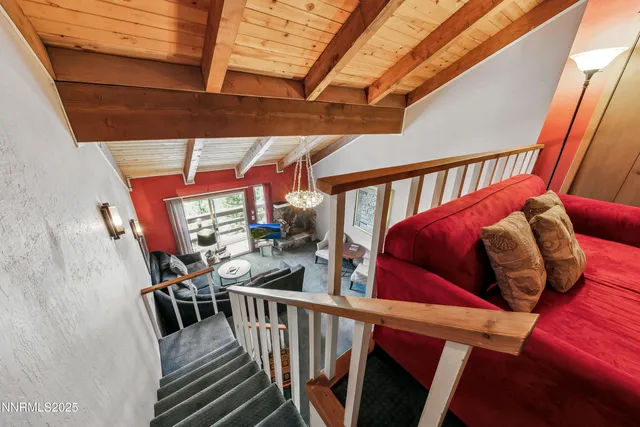 a view of balcony with furniture