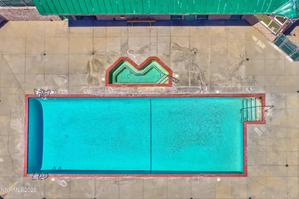 swimming pool view with a outdoor space