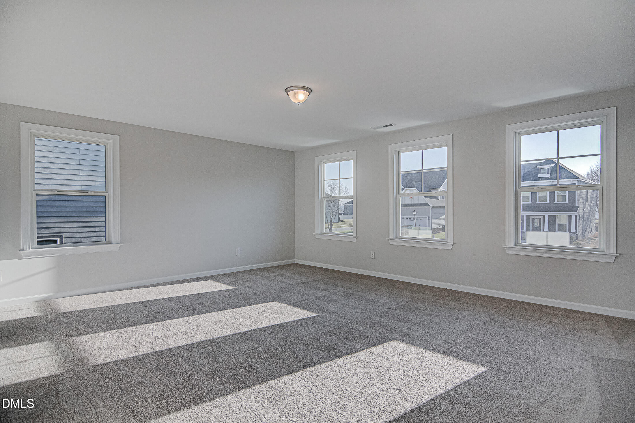 108 Starlet Ridge Way Clayton, NC 27520 - Photo 25 of 37 a view of an empty room with a window