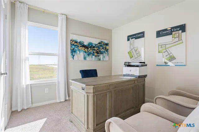 a view of room with window and bathroom