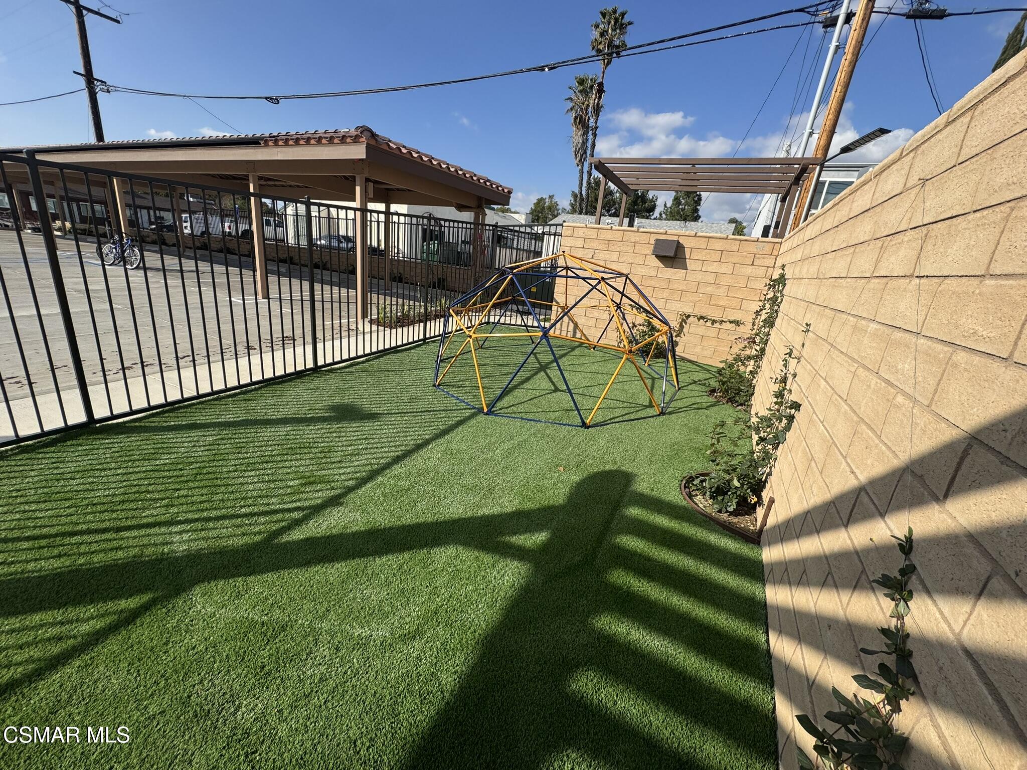 1850 Buyers Street, Unit 202 Simi Valley, CA 93063 - Photo 5 of 15 a view of a house with a yard