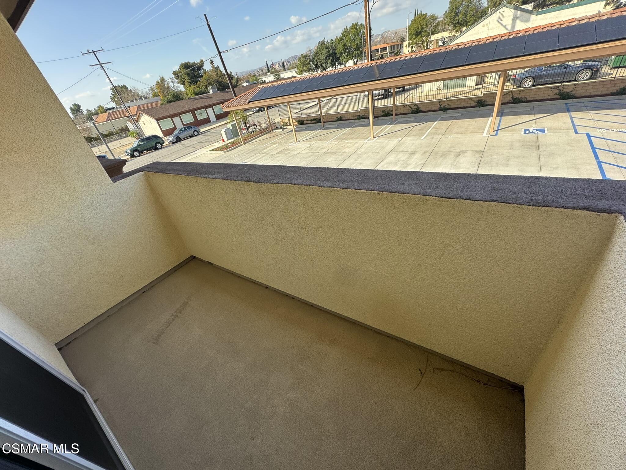 1850 Buyers Street, Unit 202 Simi Valley, CA 93063 - Photo 8 of 15 a view of a room with a wooden floor