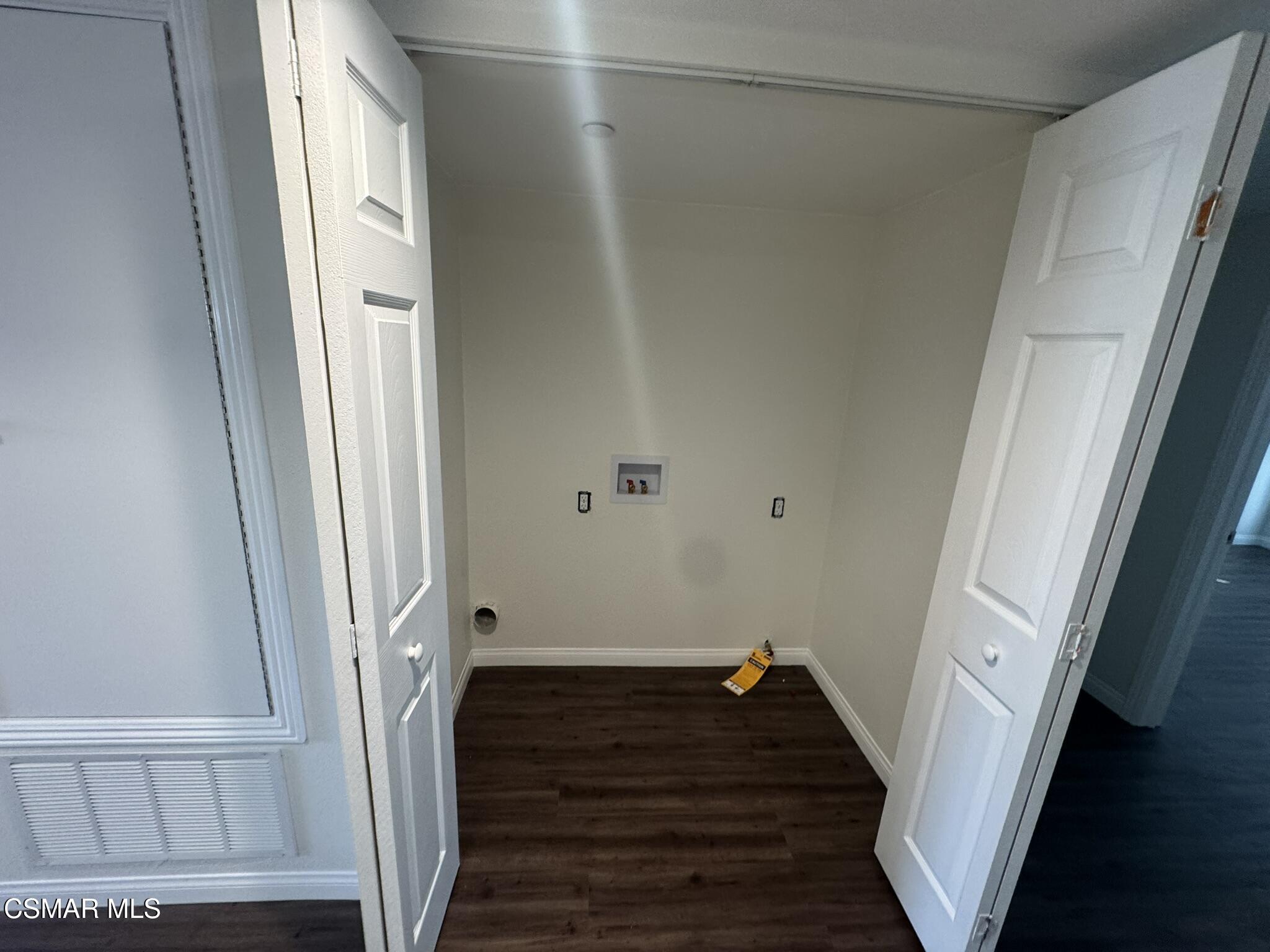1850 Buyers Street, Unit 202 Simi Valley, CA 93063 - Photo 10 of 15 a view of a hallway with wooden floor and staircase