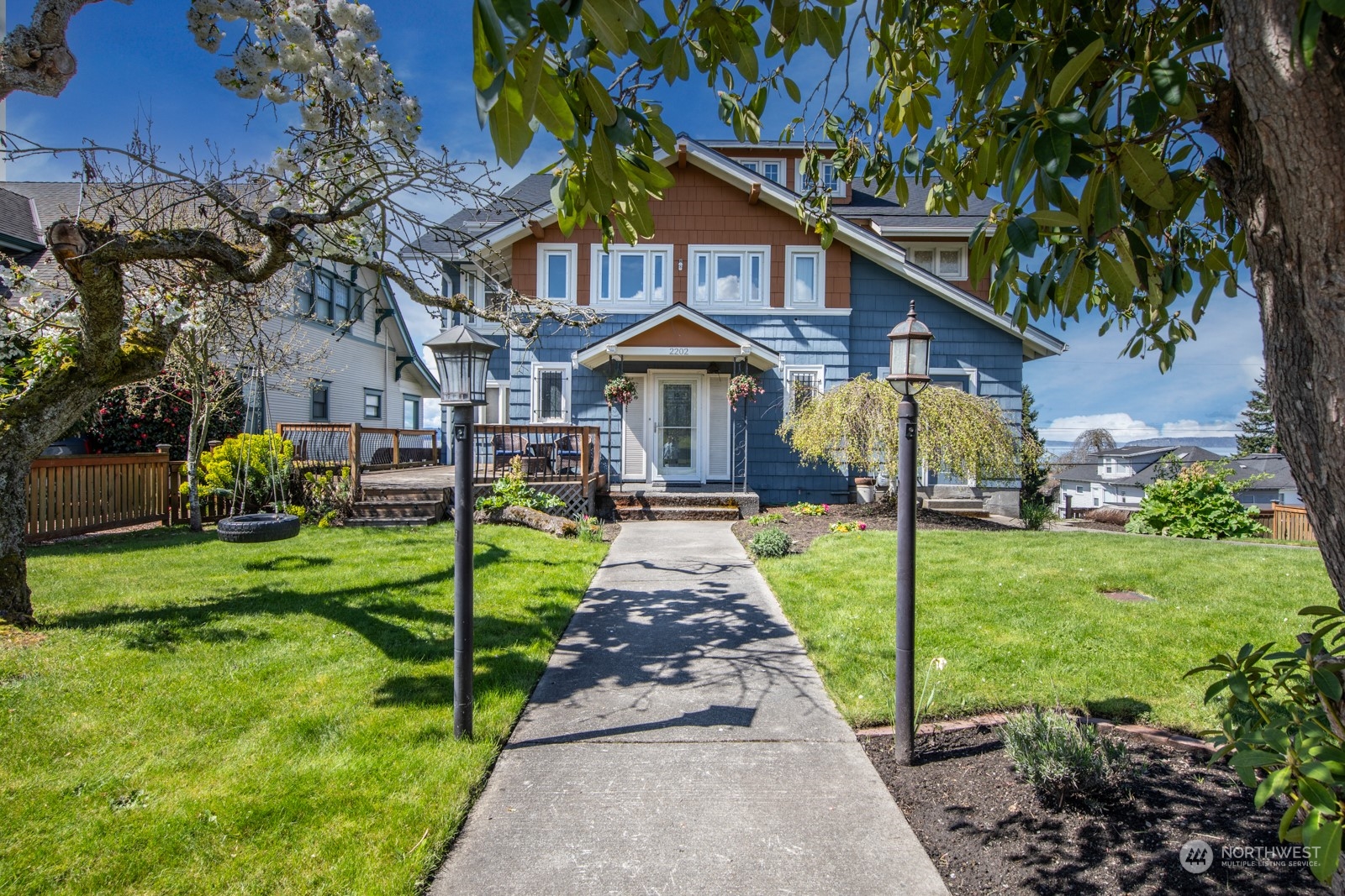 2202 Rucker Avenue Everett, WA 98201 - Photo 1 of 37 a front view of a house with garden