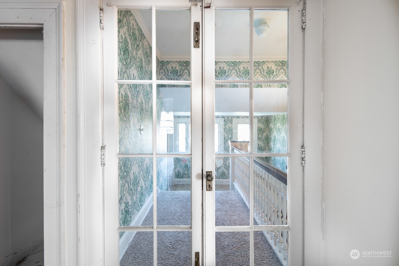 2202 Rucker Avenue Everett, WA 98201 - Photo 14 of 37 a bathroom with a glass shower door and a window