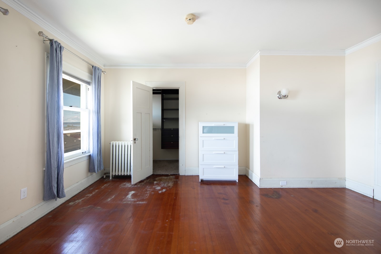 2202 Rucker Avenue Everett, WA 98201 - Photo 18 of 37 an empty room with wooden floor and windows