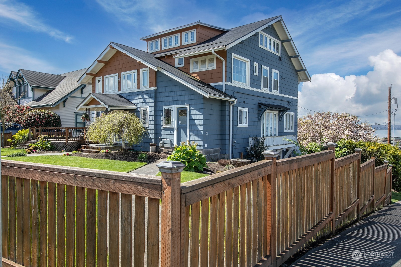 2202 Rucker Avenue Everett, WA 98201 - Photo 2 of 37 a front view of a house with a yard