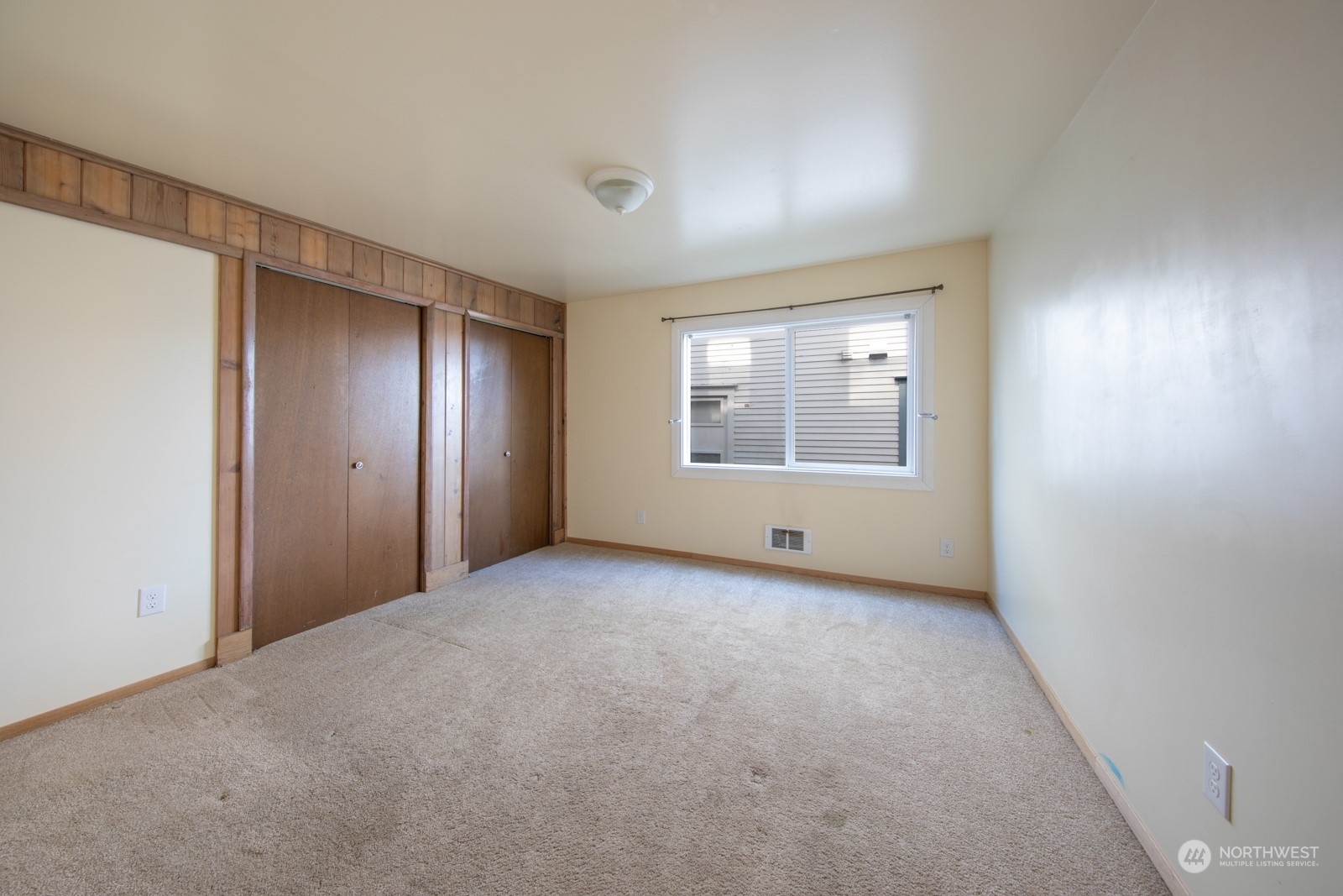 2202 Rucker Avenue Everett, WA 98201 - Photo 25 of 37 a view of an empty room with windows