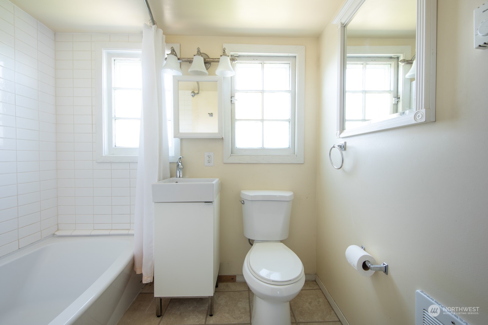 2202 Rucker Avenue Everett, WA 98201 - Photo 29 of 37 a bathroom with a sink toilet and shower