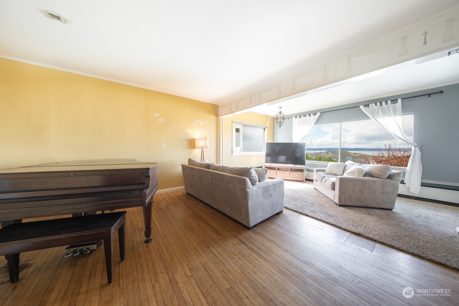 2202 Rucker Avenue Everett, WA 98201 - Photo 4 of 37 a living room with furniture and a large window