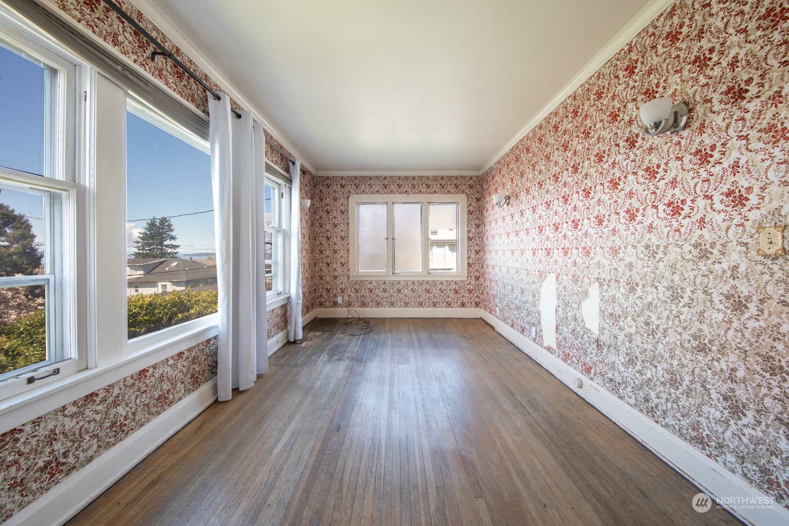 2202 Rucker Avenue Everett, WA 98201 - Photo 8 of 37 a view of a room with wooden floor and walls