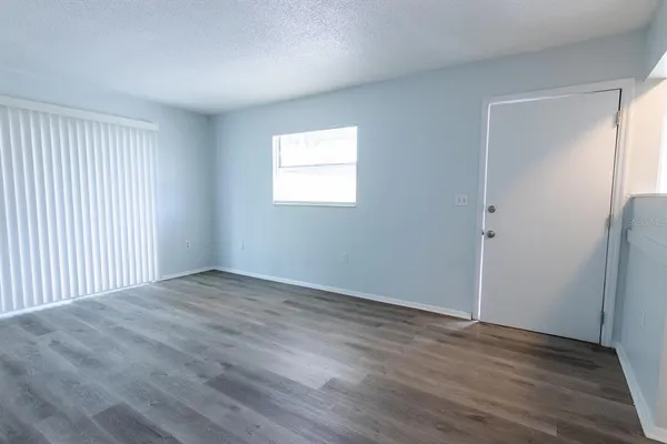 a view of backyard with green space