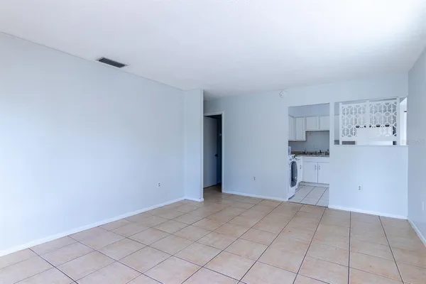a view of a kitchen with a sink