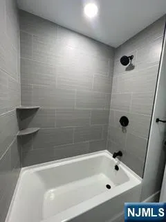 a bathroom with a bathtub