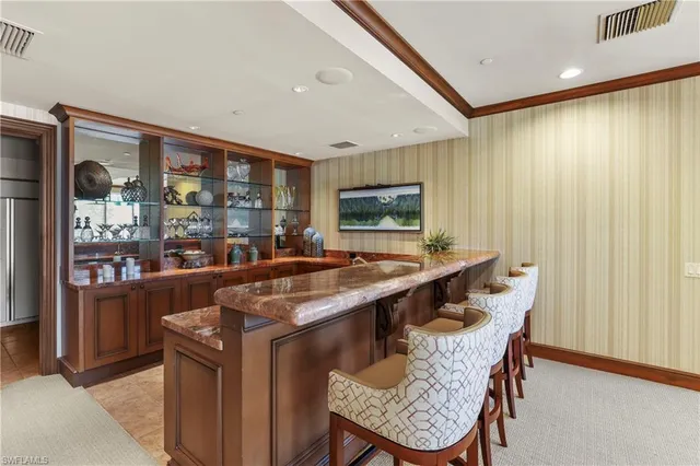 a kitchen with a table and chairs