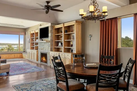 a view of a dining room with furniture window and wooden floor