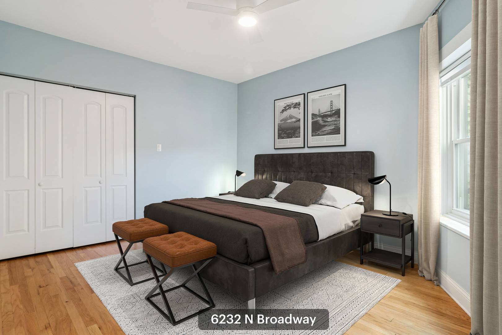 6232 North Broadway, Unit 2 Chicago, IL 60660 - Photo 16 of 22 a bedroom with a bed and wooden floor