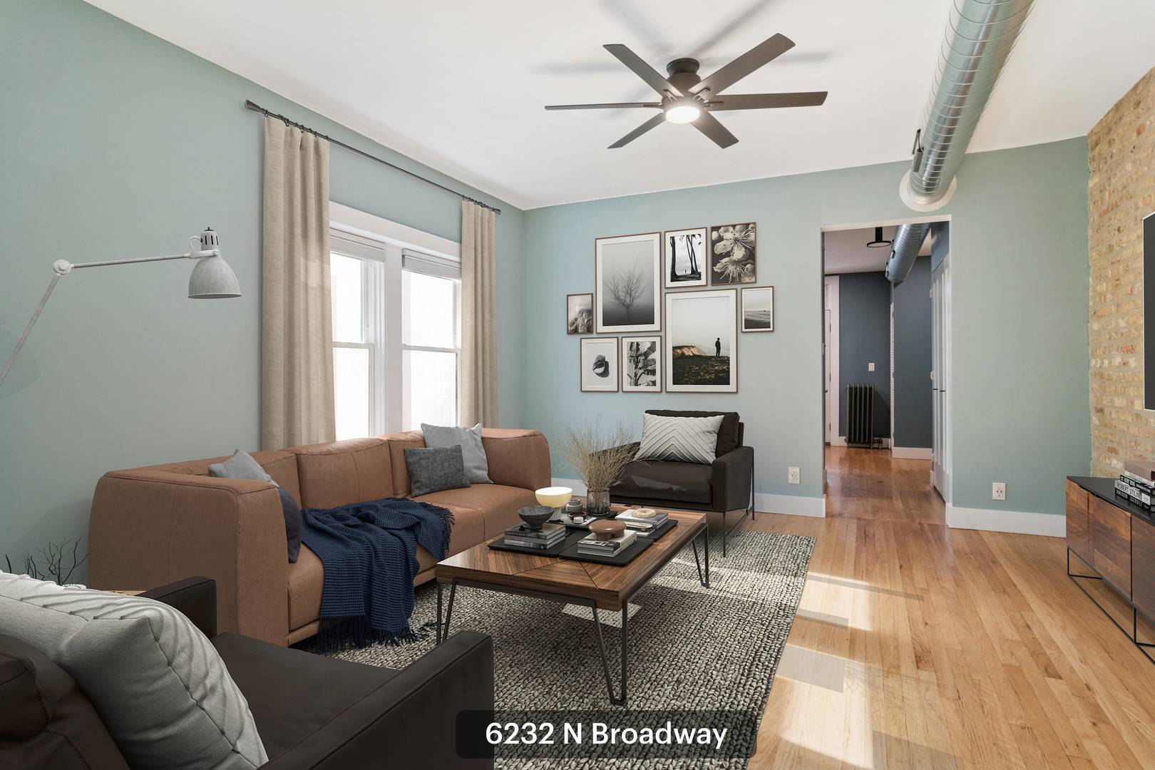 6232 North Broadway, Unit 2 Chicago, IL 60660 - Photo 10 of 22 a living room with furniture and a window