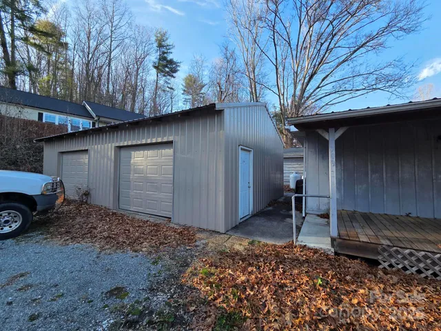 a house view with a backyard space