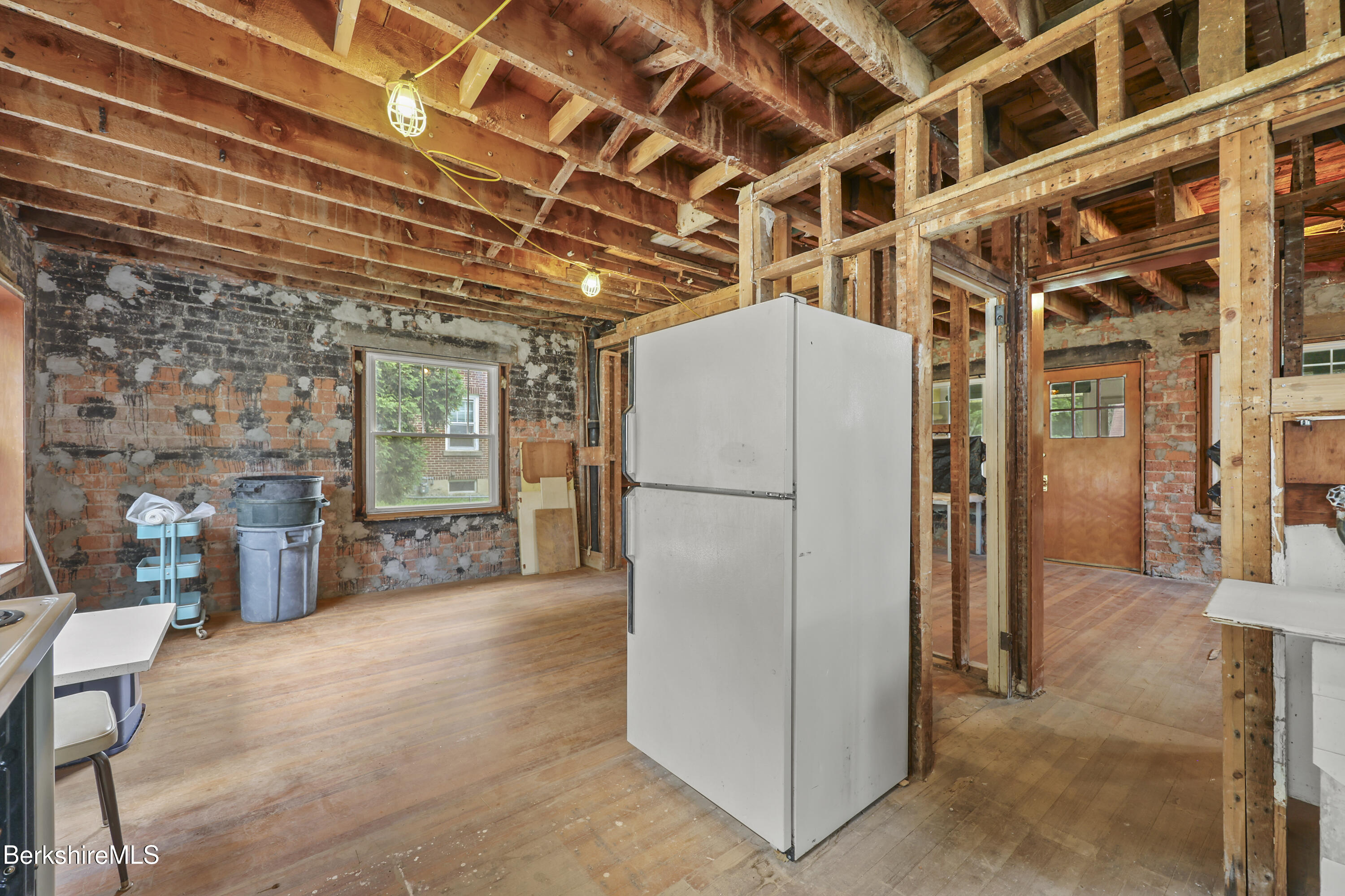 84 Notch Road North Adams, MA 01247 - Photo 17 of 30 a view of an empty room with a refrigerator
