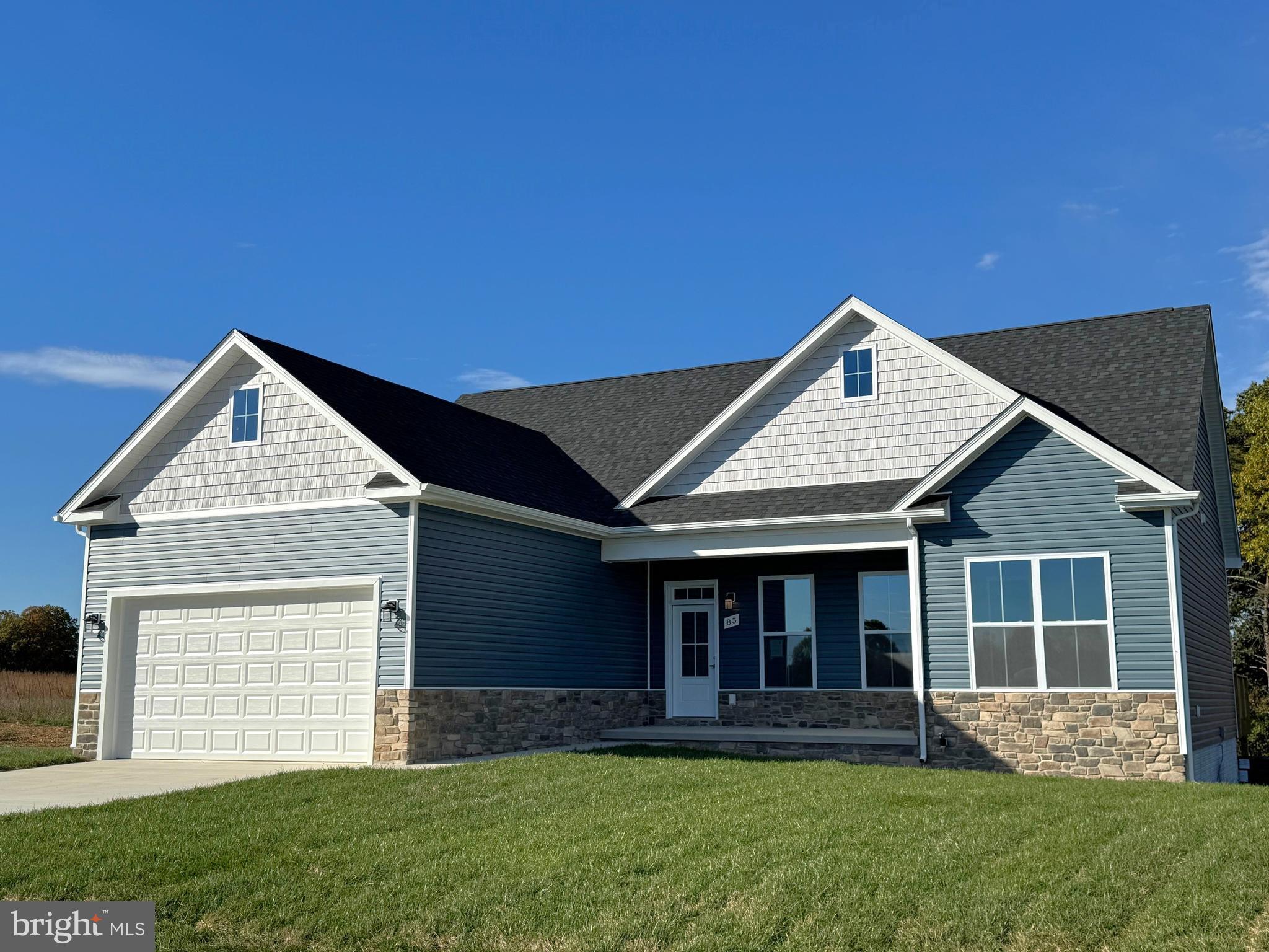 8 Glenaire Road Bunker Hill, WV 25413 - Photo 1 of 17 front view of a house with a yard