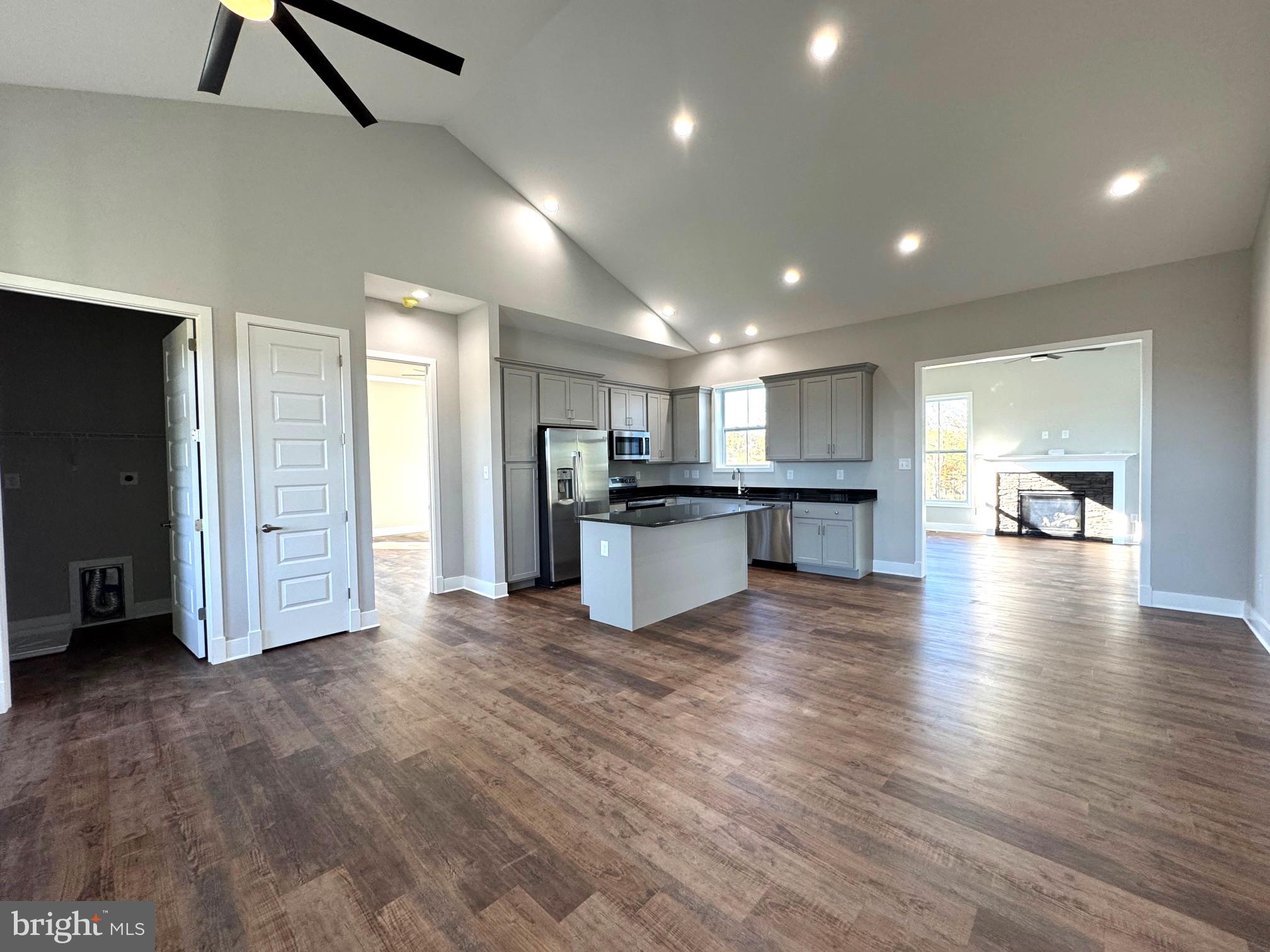 8 Glenaire Road Bunker Hill, WV 25413 - Photo 17 of 17 a view of kitchen with refrigerator and wooden floor
