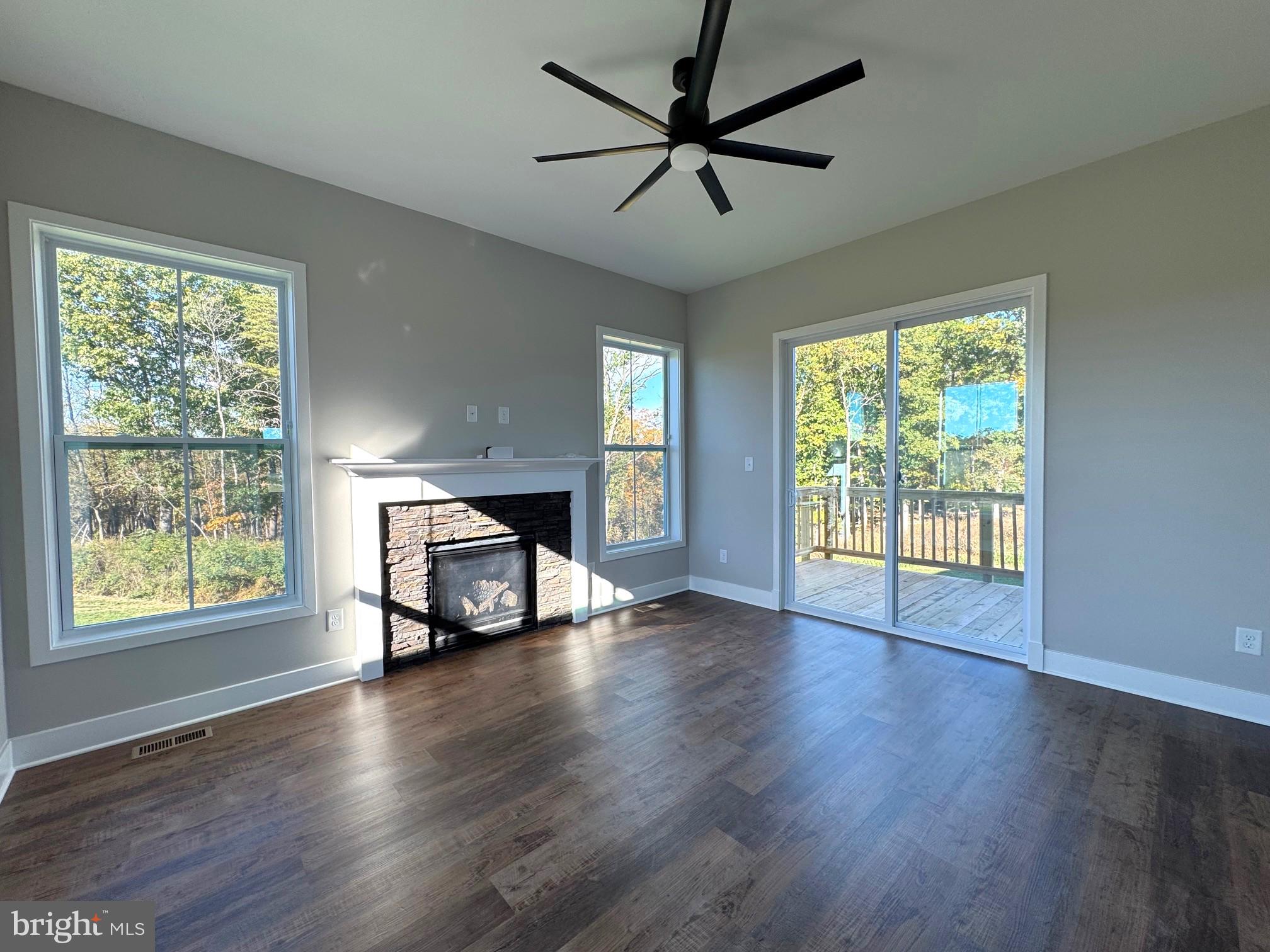 8 Glenaire Road Bunker Hill, WV 25413 - Photo 6 of 17 a living room with hardwood floor and a window