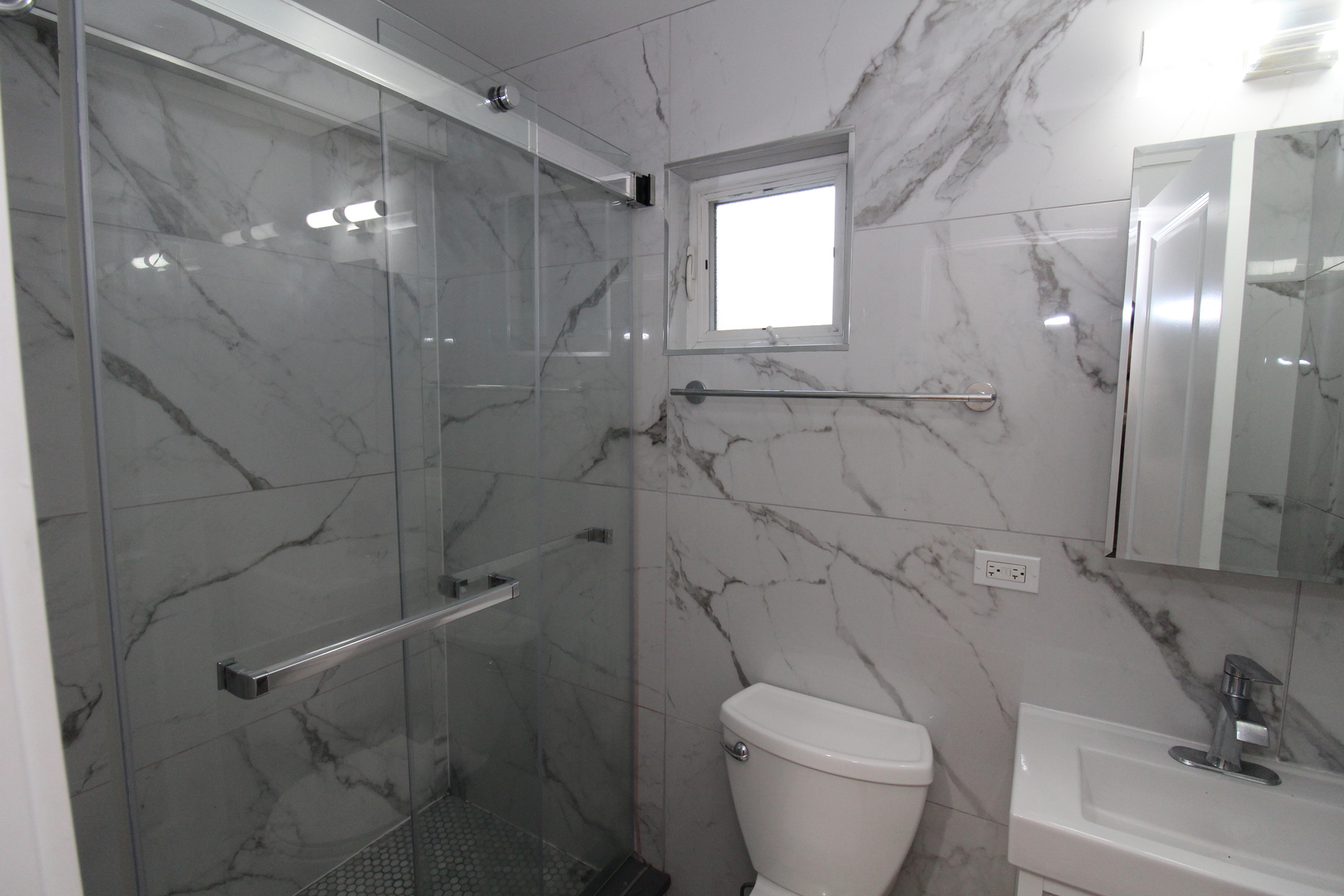 1411 West Taylor Street, Unit 1R Chicago, IL 60607 - Photo 9 of 17 a bathroom with a toilet and a shower