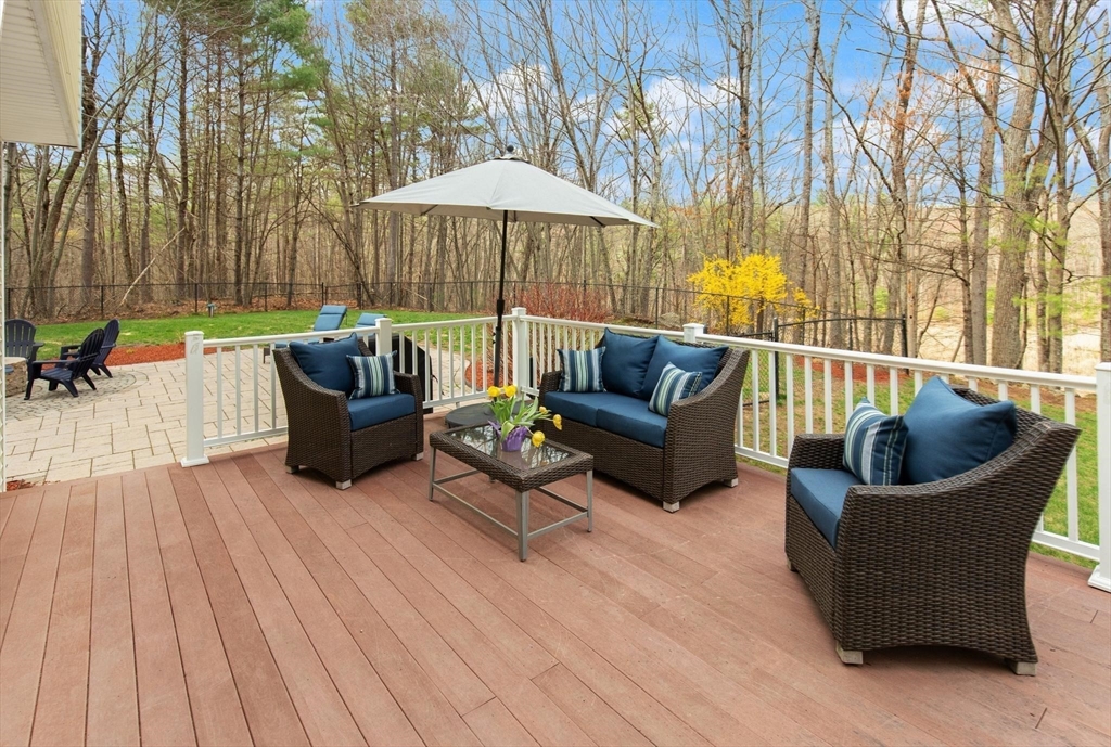 41 Chestnut Road Tyngsborough, MA 01879 - Photo 28 of 32 a view of a couches in patio of a house