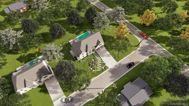 an aerial view of house with yard