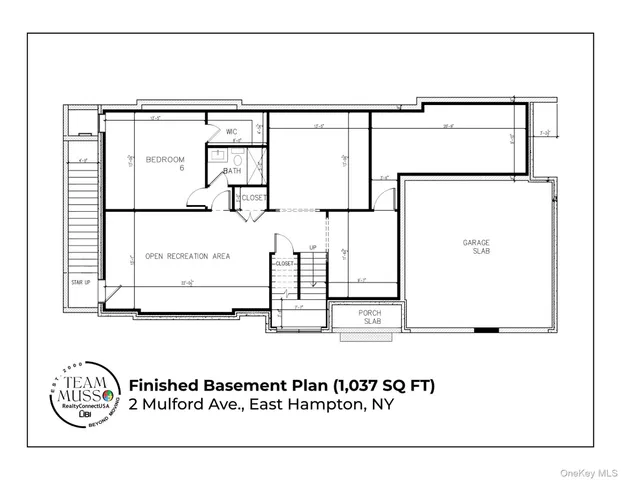 a black and white photo of a next to wall