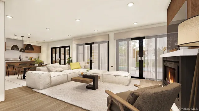 a living room with furniture window and a fireplace