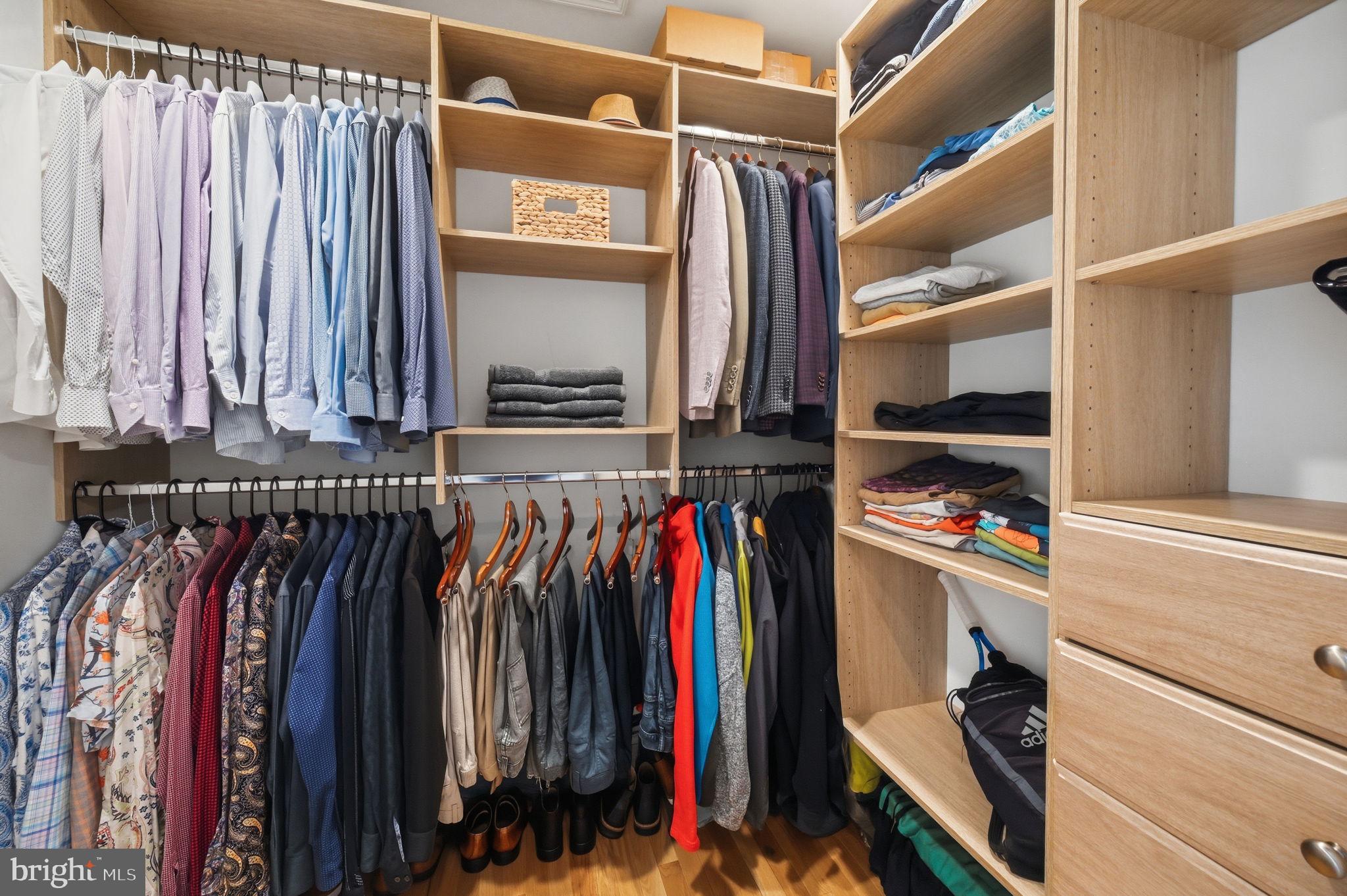 11641 Glen Road Potomac, MD 20854 - Photo 26 of 40 a view of walk in closet with clothes