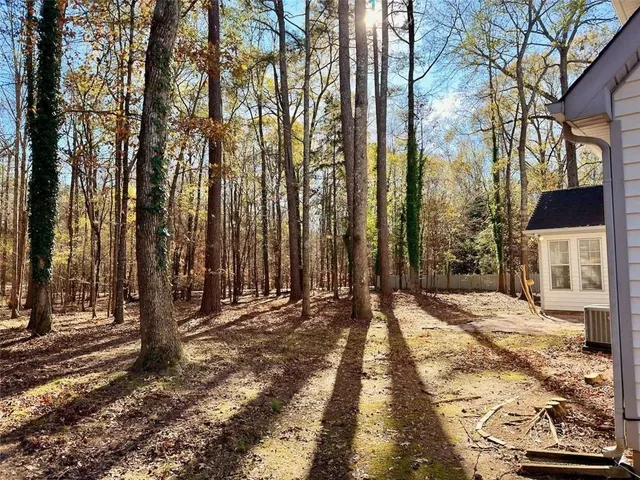 a view of a backyard of the house