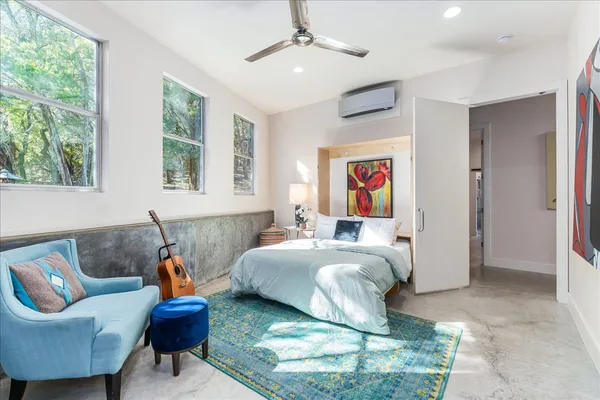 a bed room with bed and furniture