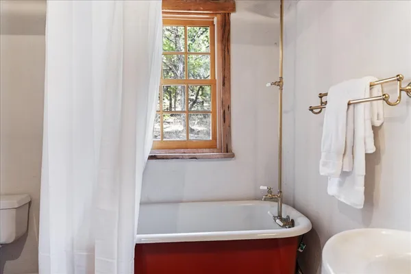 a bathroom with a sink and a bathtub