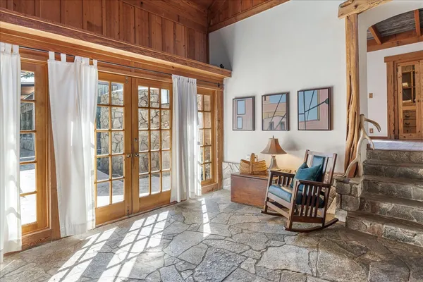 a view of a livingroom with furniture and windows