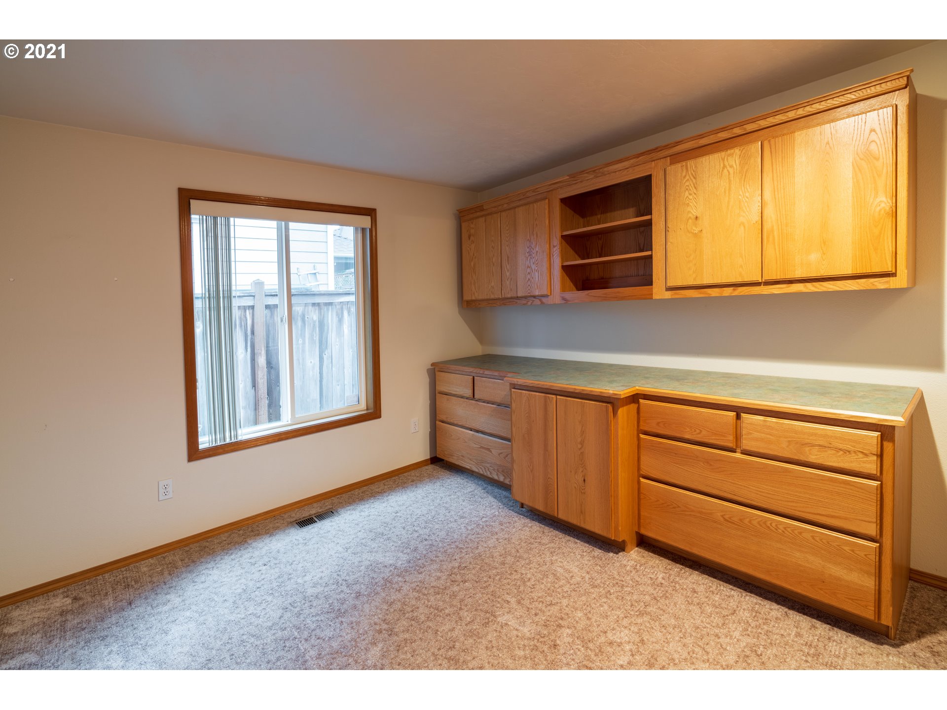 3305 Falcon Drive Springfield, OR 97477 - Photo 14 of 26 a kitchen with window and cabinet