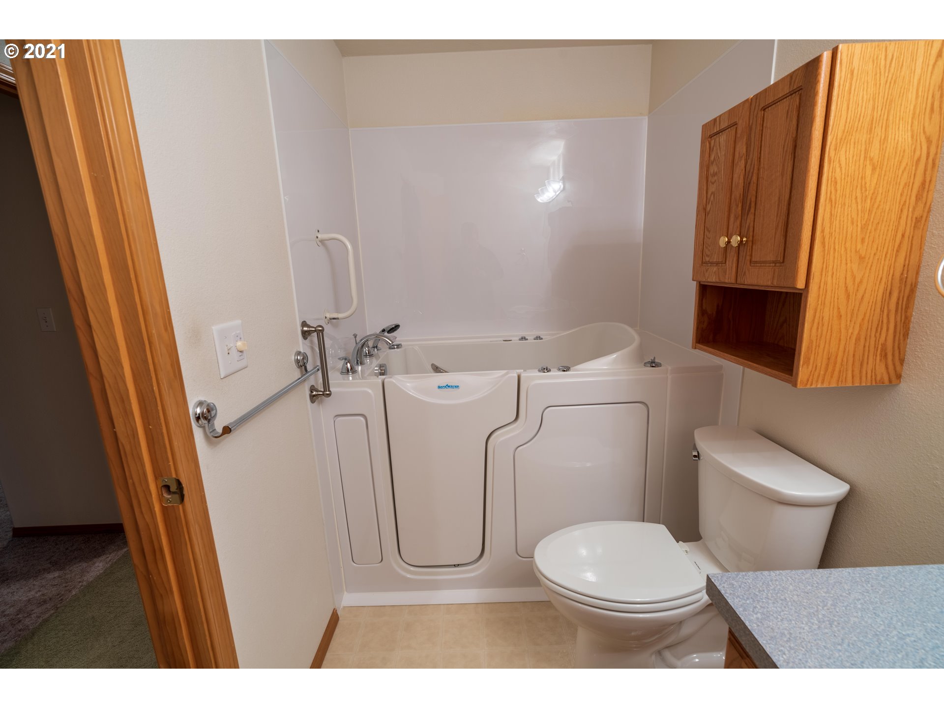 3305 Falcon Drive Springfield, OR 97477 - Photo 16 of 26 a bathroom with a toilet and a shower