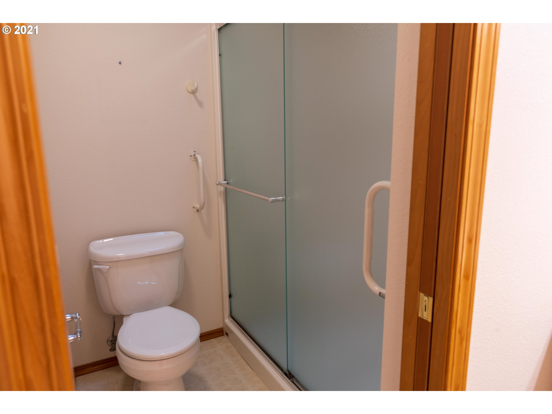 3305 Falcon Drive Springfield, OR 97477 - Photo 21 of 26 a bathroom with a toilet and a shower