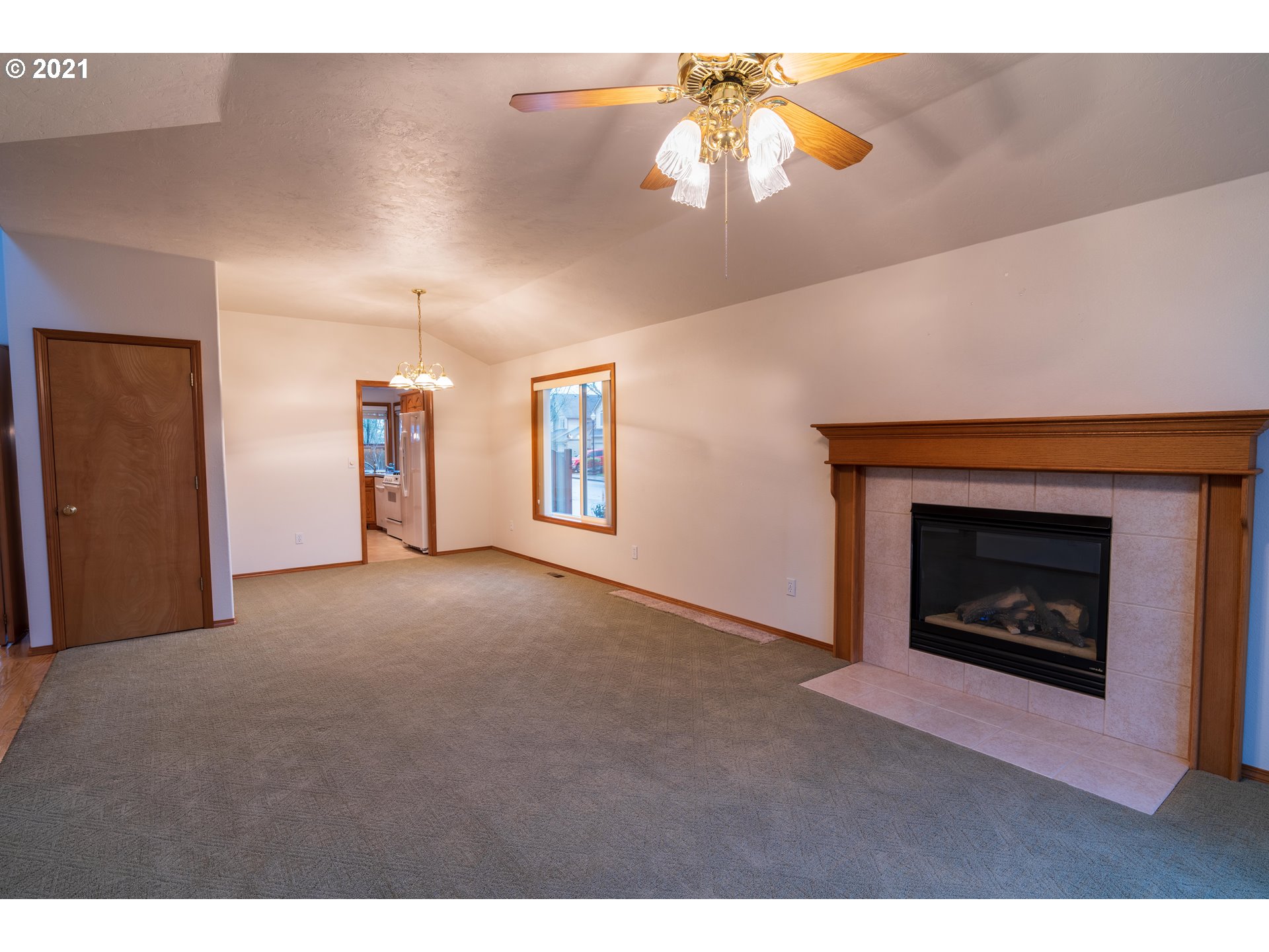 3305 Falcon Drive Springfield, OR 97477 - Photo 7 of 26 a view of empty room with a fireplace