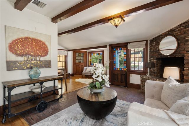 a living room with furniture and a gate