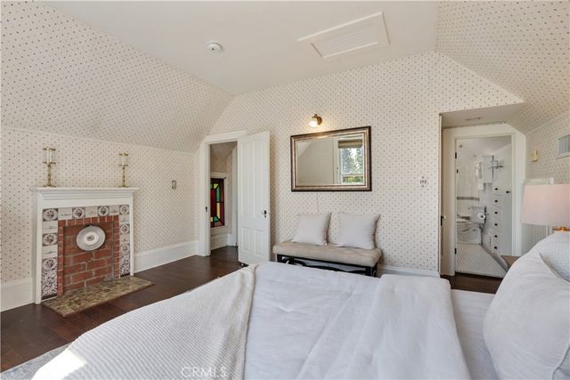 a view of a house with backyard sitting area and furniture
